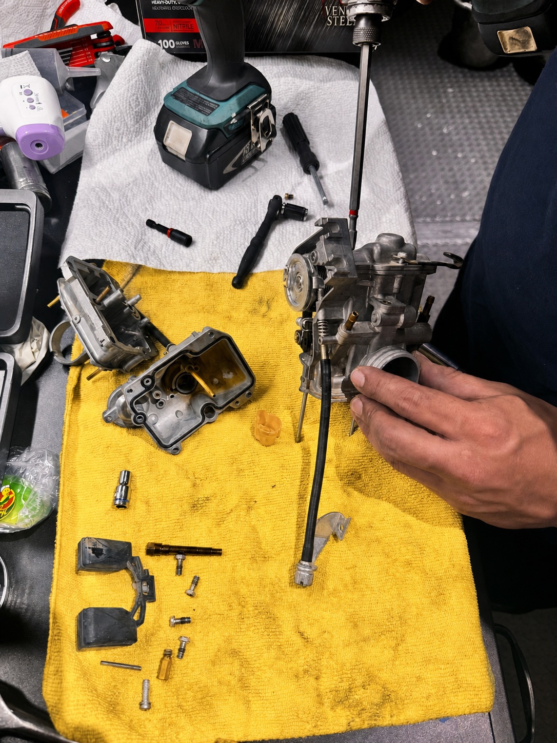 Detailed mechanical service on a disassembled motorcycle component